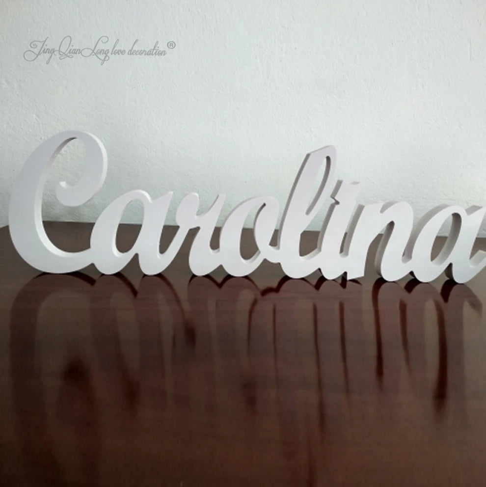 Personalized baby name plaque wall hanging wooden art above a bed custom children’s