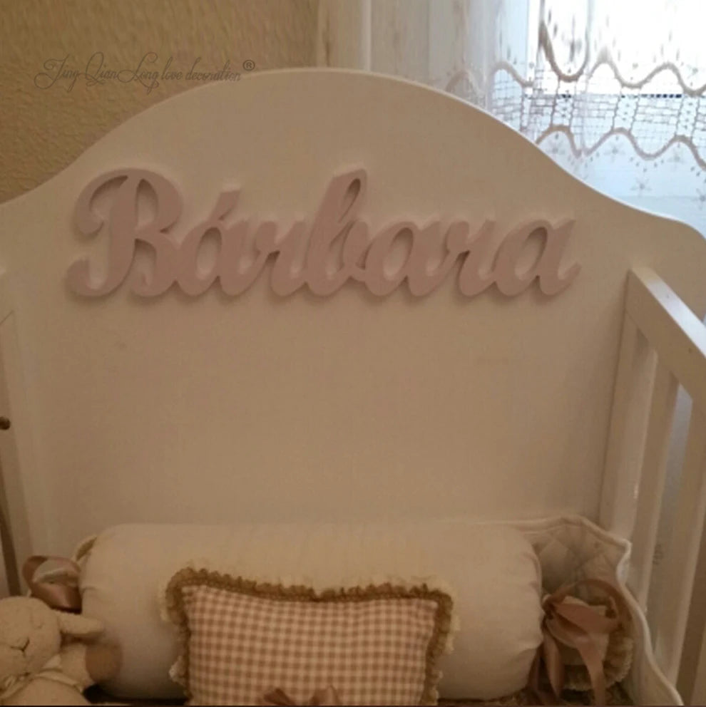 Personalized baby name plaque wall hanging wooden art above a bed custom children’s