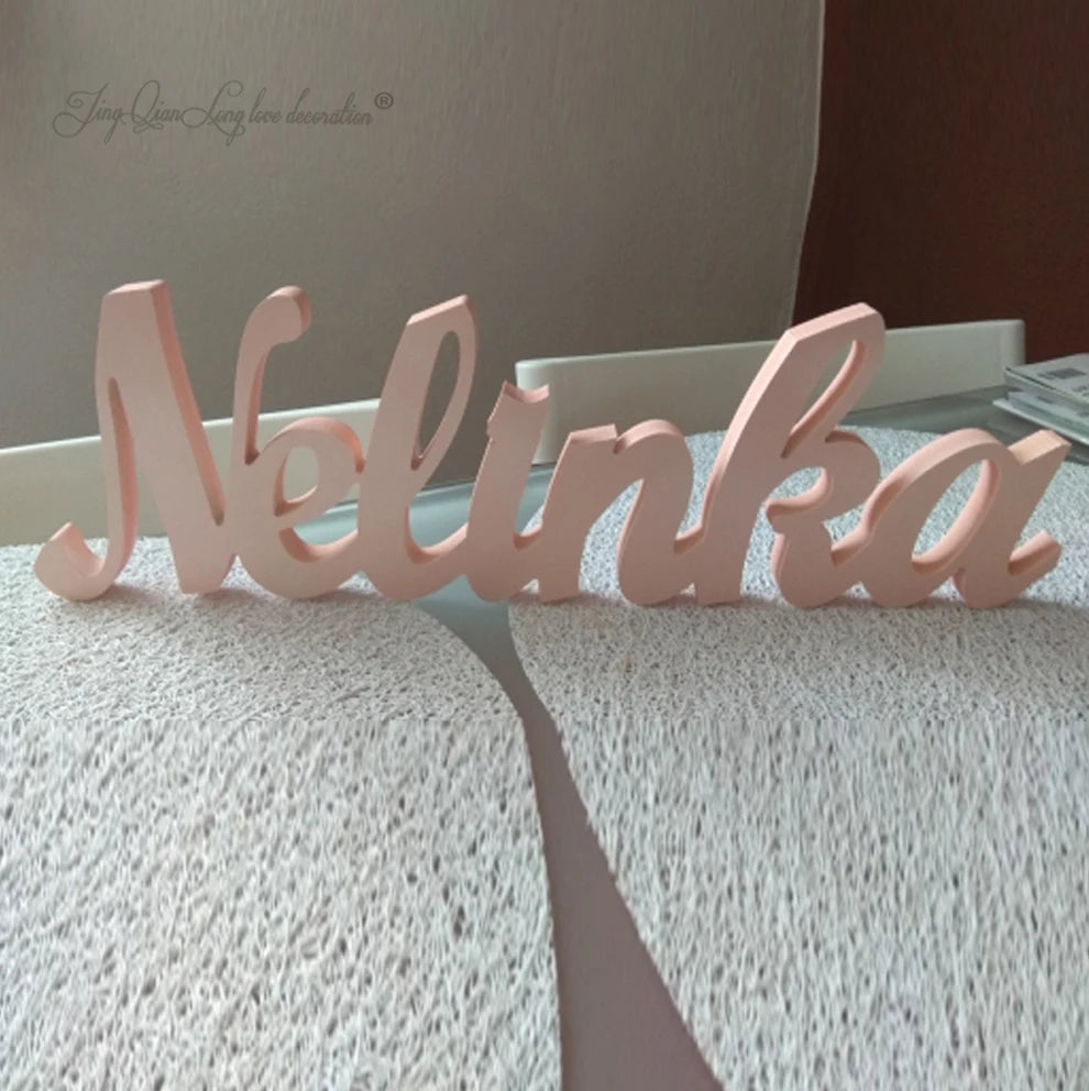 Personalized baby name plaque wall hanging wooden art above a bed custom children’s