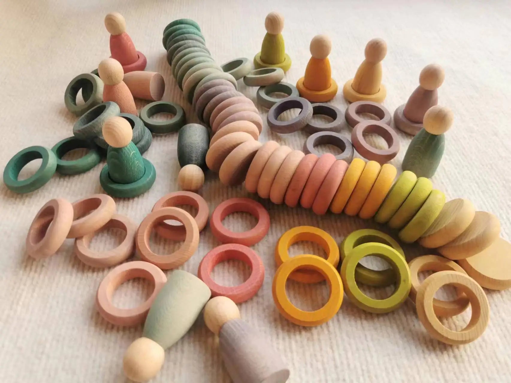 Kids wooden toys beech rainbow coins and rings stacking blocks with peg dolls loose parts - game