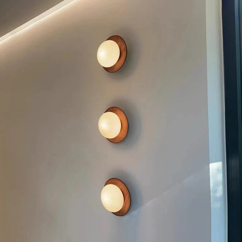 wabi-sabi-style-nature-wood-walnut-color-bedroom-bedside-wall-lights-milky-white-round-glass-wall-lamp-for-hallway-stair-aisle