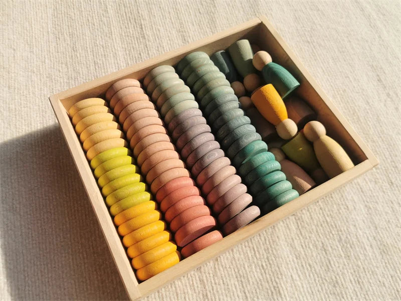 Kids wooden toys beech rainbow coins and rings stacking blocks with peg dolls loose parts - pastel in tray 84 - game