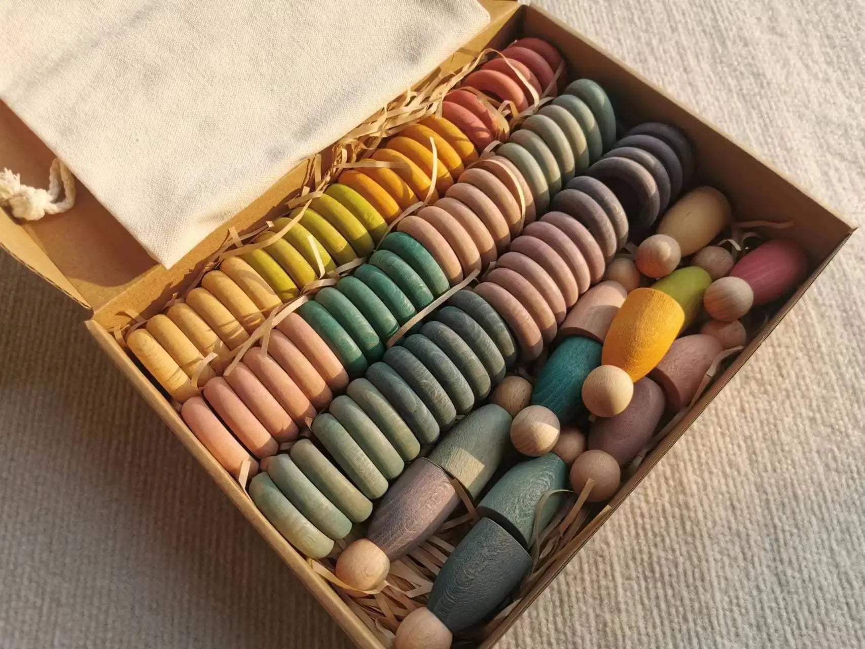 Kids wooden toys beech rainbow coins and rings stacking blocks with peg dolls loose parts - game