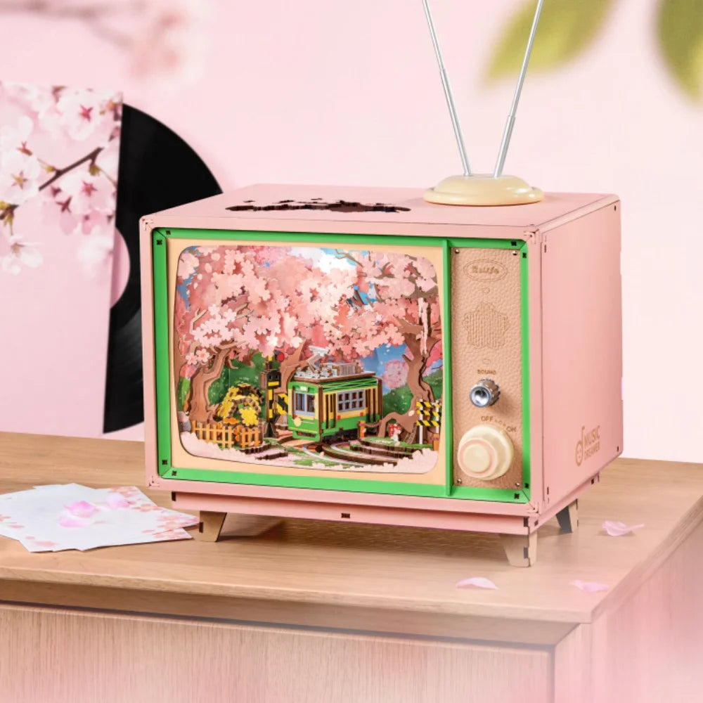 robotime-rolife-diy-music-box-sakura-dreamy-tour-3d-wooden-puzzle-book-nook-tv-model-kit-home-decoration-birthday-gift-for-adult